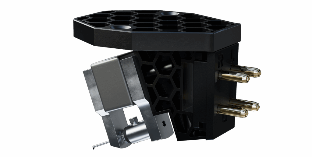 Ortofon MC X20 moving coil phono cartridge internal view. Ortofon uses an injection-molded, honeycomb-structured stainless-steel frame on all models.