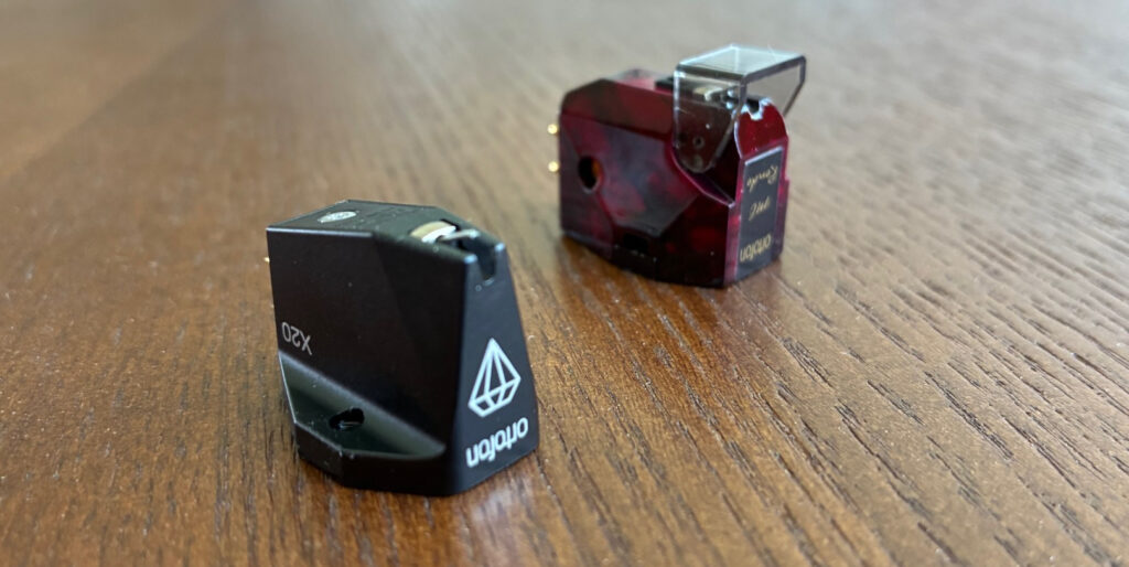The newer Ortofon MC X20 Phono Cartridge flanked by the older model Rondo Red